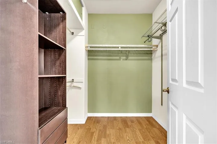 Primary Bedroom Walk In Closet Storage and Organizer