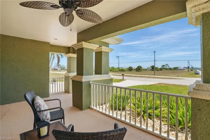 Front porch featuring a porch and a ceiling fan