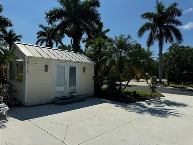 View of outdoor structure with french doors