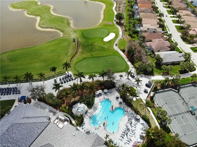 Bird's eye view of a local golf course and a large body of water