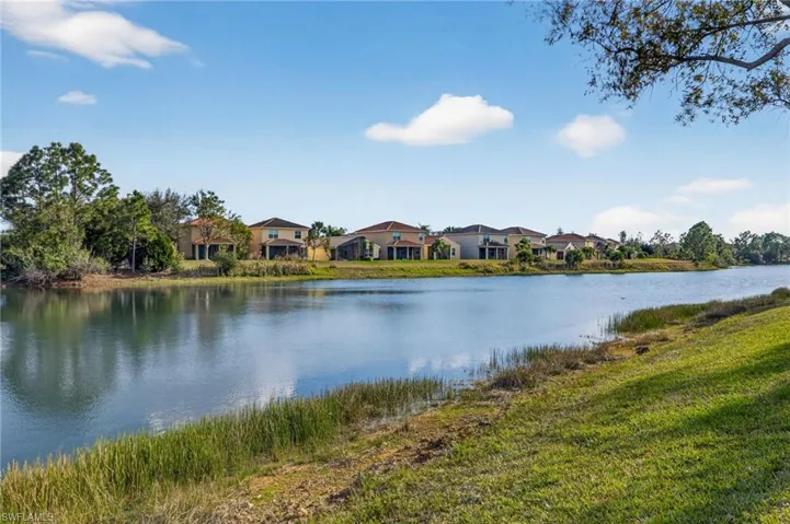 Water view featuring nearby suburban area