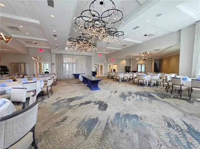 Building lobby with recessed lighting and a high ceiling
