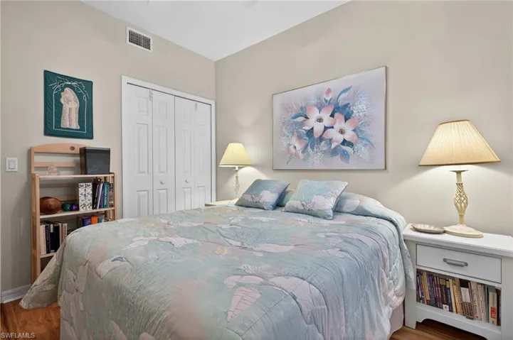 Bedroom featuring a closet and wood finished floors