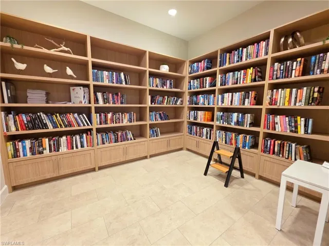 Living area with wall of books