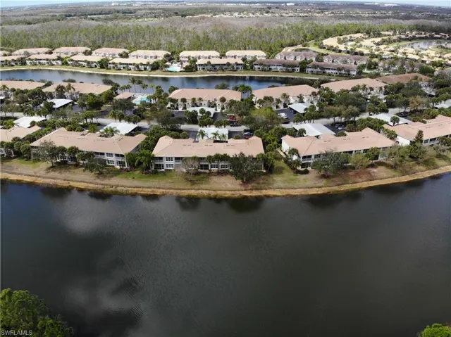 Aerial view of residential area with a nearby body of water