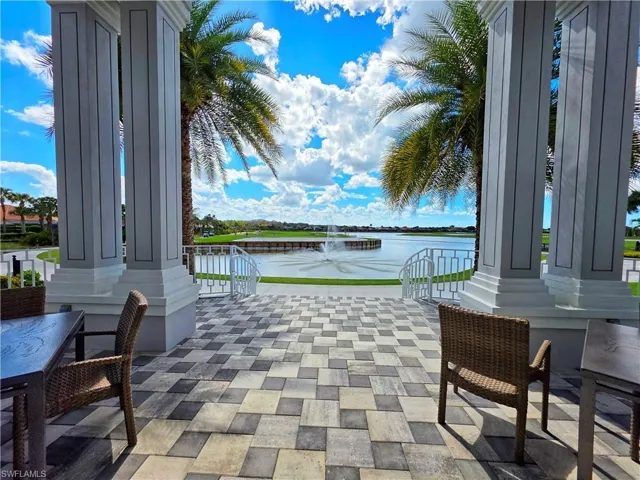 View of patio / terrace with a water view