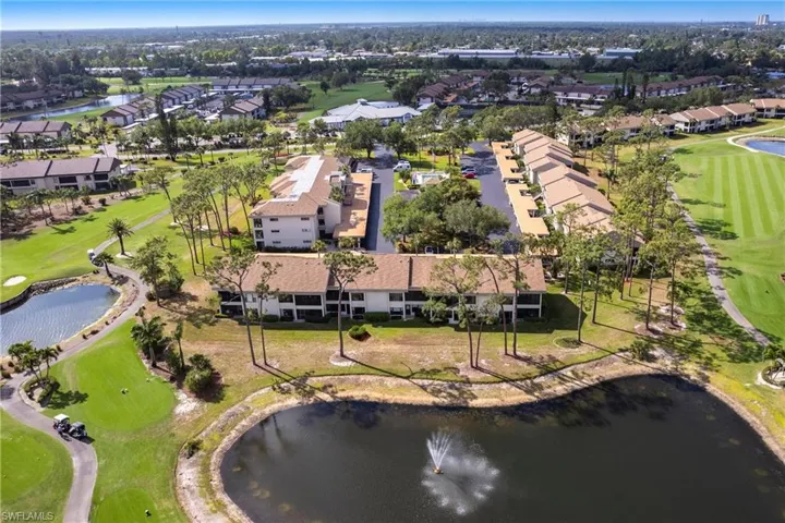 View of property location with a nearby pond