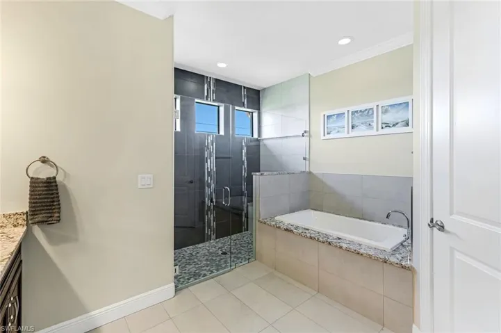 Primary Bathroom with separate Tub and Shower.