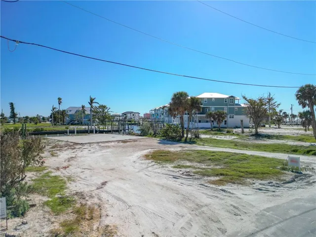 View of dirt / gravel road featuring a residential view