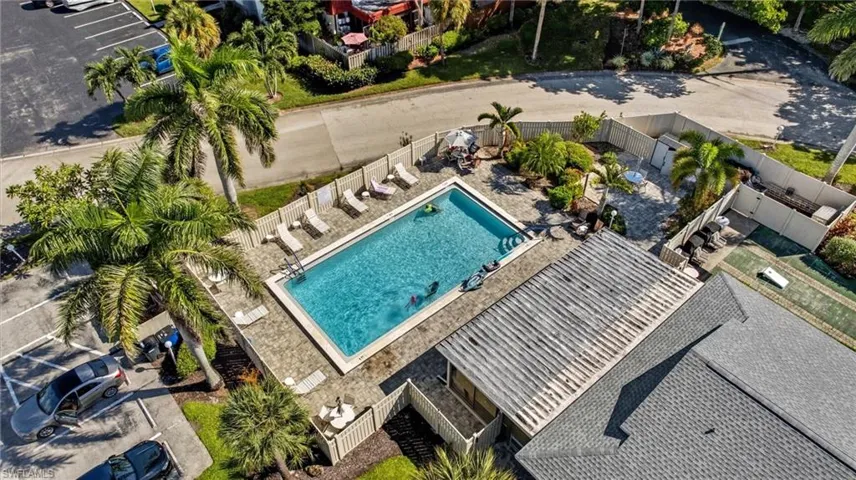 Community pool featuring a patio