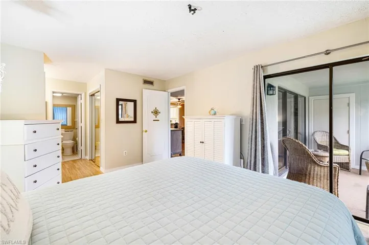 Bedroom featuring a closet and baseboards