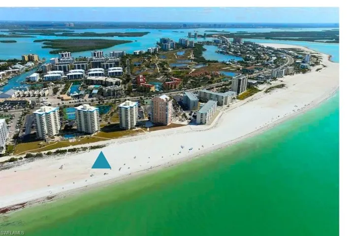 Estero Beach Tennis  3  bldgs blue stripe on top