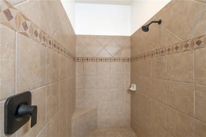 Bathroom with a tile shower