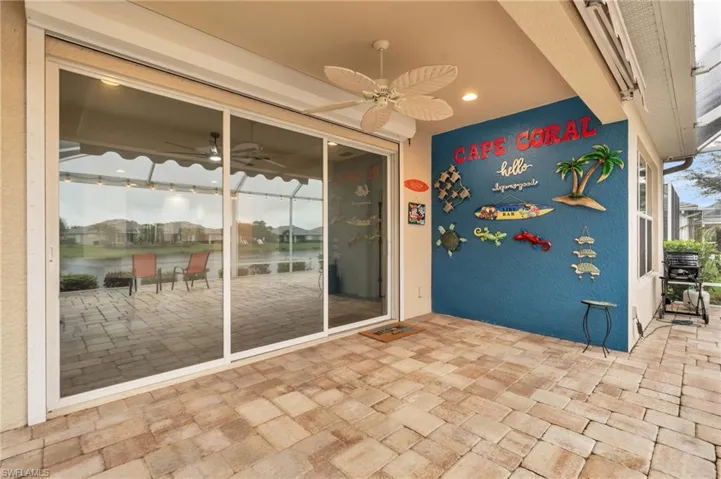 View of patio featuring ceiling fan