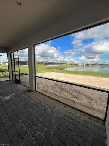 Extended covered lanai with water views - updated 12/27/2023