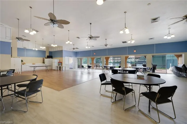Dining room featuring ceiling fan and light hardwood / wood-style floors