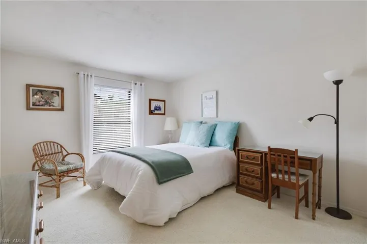 Bedroom featuring carpet floors