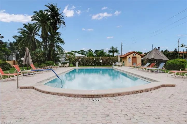 View of swimming pool with a patio