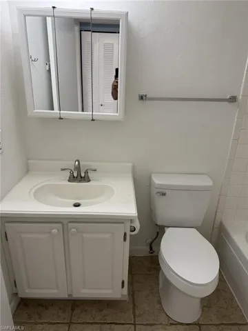 Bathroom featuring vanity and tile patterned floors