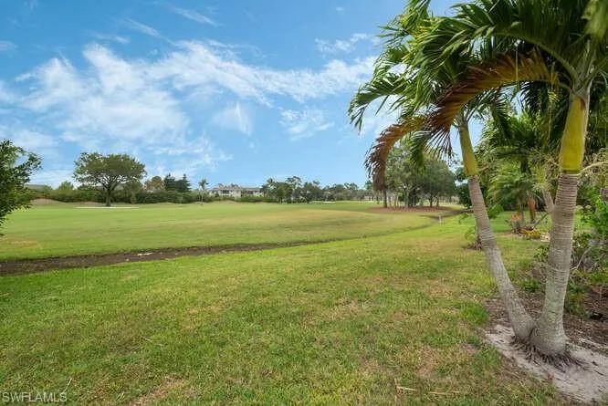 Nice yard .27 lot overlooking Royal Palm Golf Course