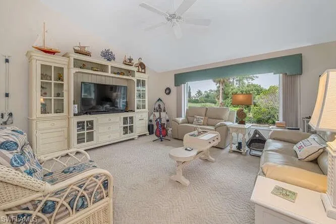 Bright Family room off kitchen. Nice Picture window to golf view