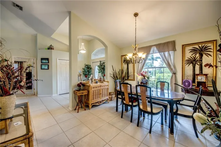 Looking in to dining area and foyer from kitchen.