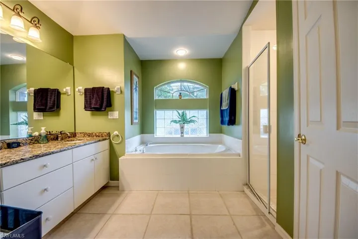 Beautiful and spacious ensuite primary bathroom featuring double vanities, plus walk in shower and toilet closet room