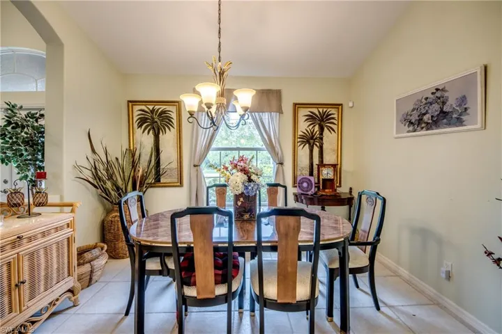 Another view of dining room with an inviting chandelier