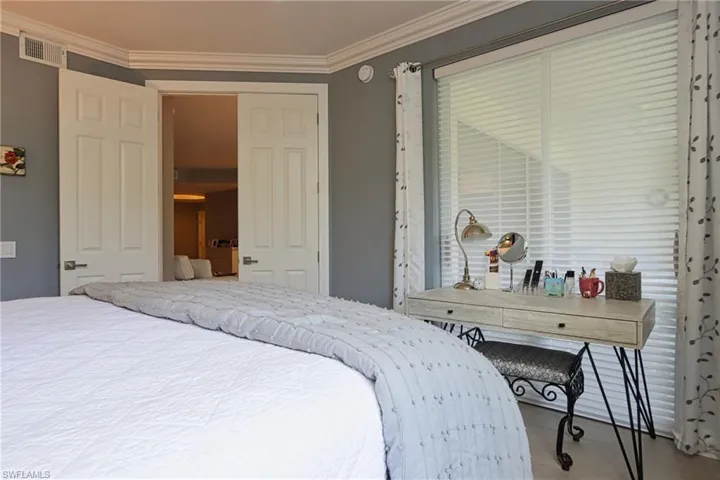 Bedroom featuring ornamental molding