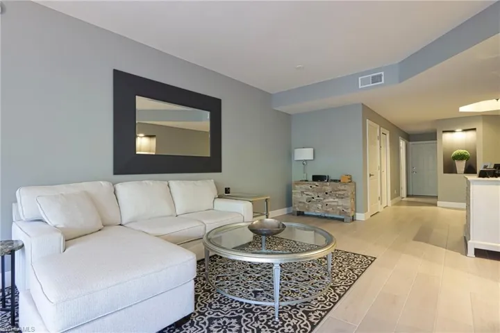 Living room featuring wood finished floors and baseboards
