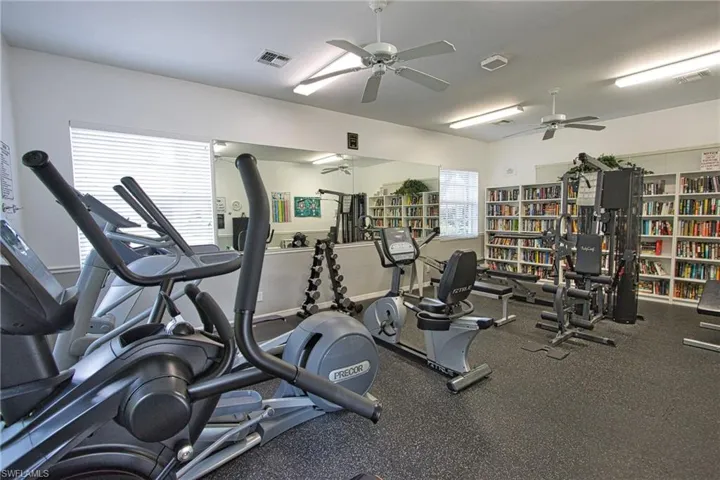 Exercise room with a ceiling fan