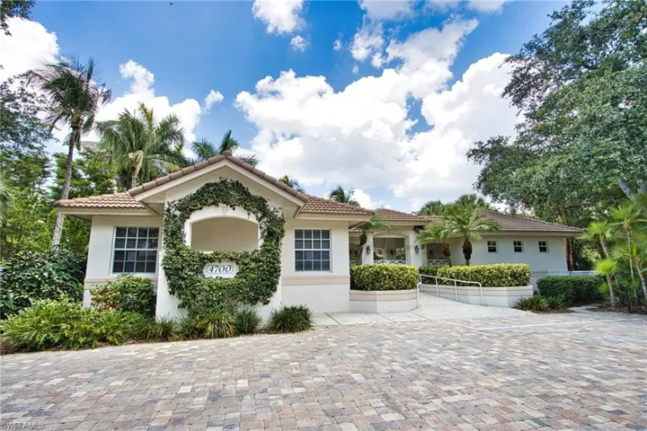 Mediterranean / spanish house featuring stucco siding and a tiled roof