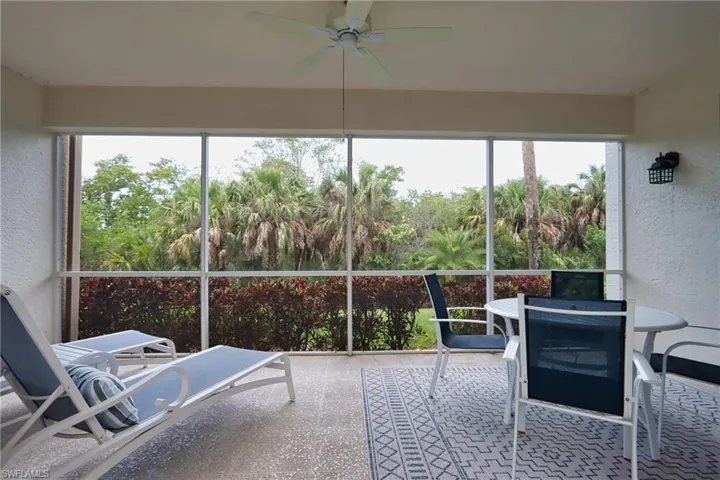 Sunroom with a ceiling fan