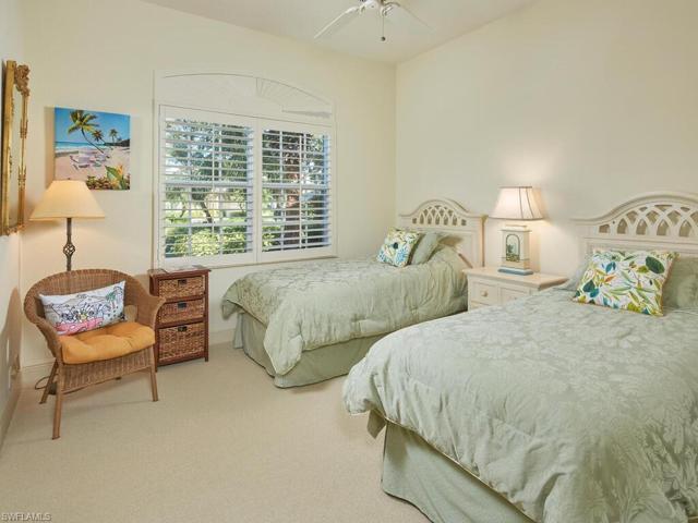 Guest bedroom furnished with twin beds.