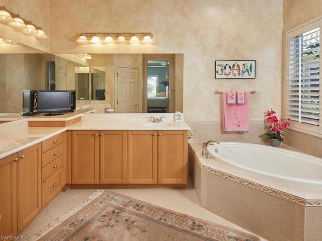 Master bath equipped with soaking tub and dual sinks. Separate walk in shower.