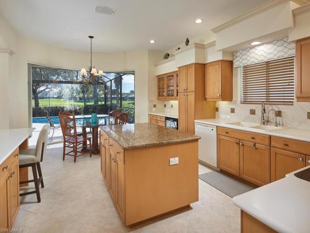 Kitchen with view toward morning room. This is a natural gas house and cooktop can be gas powered.