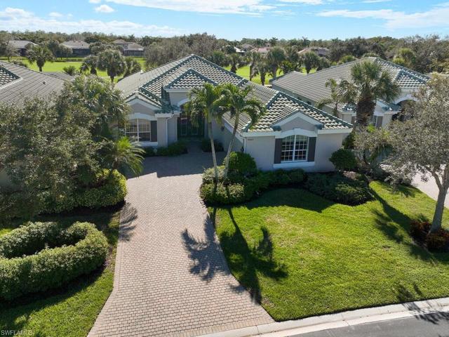 Front aerial view of house and lot.