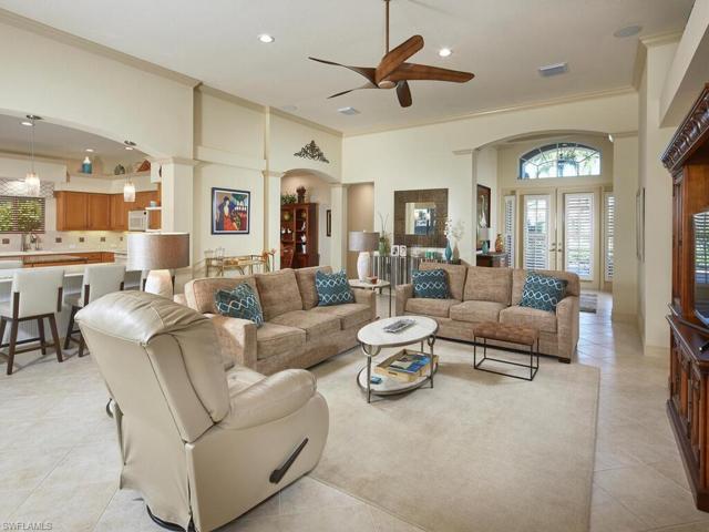 Great room, open kitchen view on left, entry to dining room beyond and foyer.
