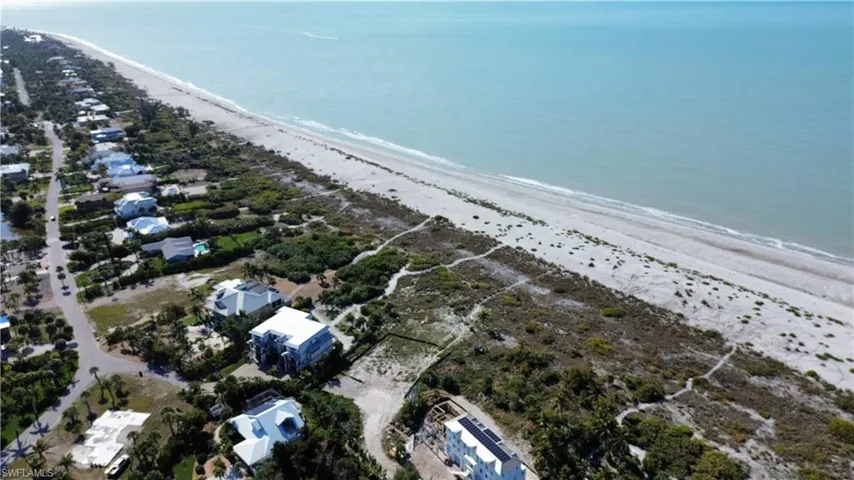 Aerial view of residential area with extended coastline