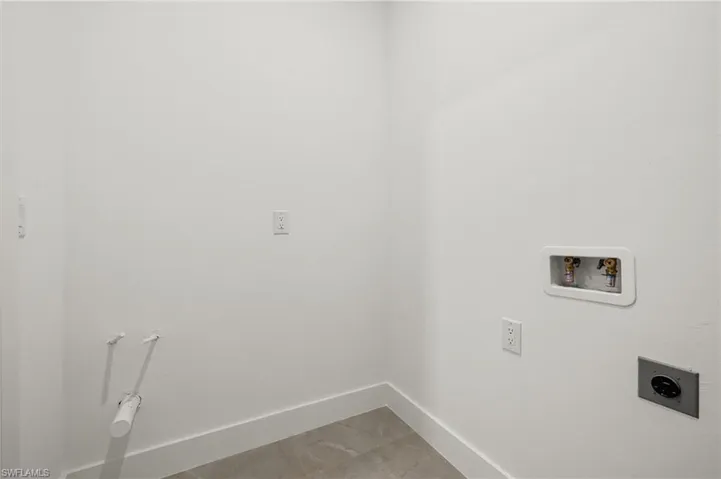 Laundry room featuring washer hookup and hookup for an electric dryer
