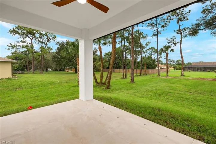 View of yard with a patio