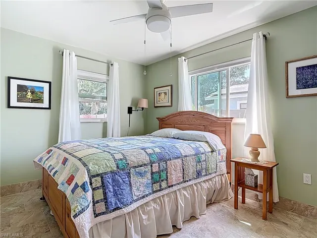 1 of 2 bedrooms.  Drapes do not stay, but shades will