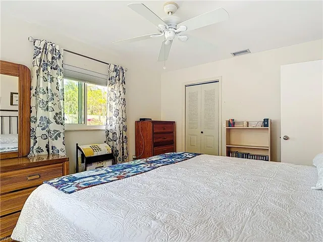 Bedroom drapes not included, but shades are.