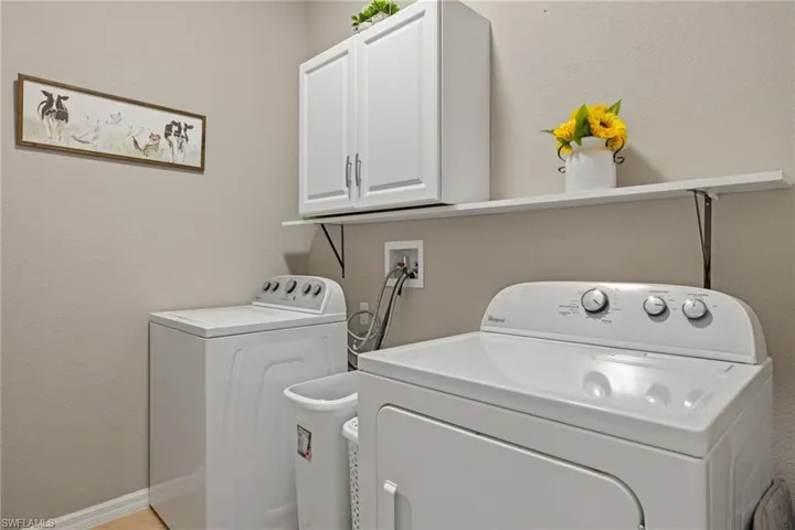 Laundry Room with Storage Cabinet