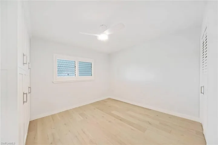 Built-In Cabinets, New Flooring & Fan.