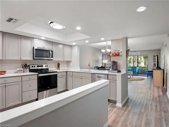 Kitchen featuring visible vents, recessed lighting, a sink, and stainless steel appliances