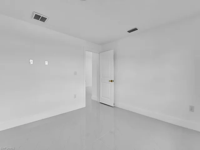 View of tiled spare room