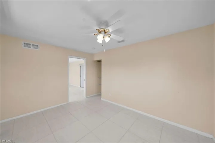 Spare room featuring ceiling fan
