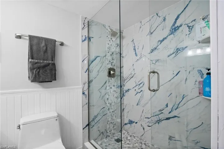 Bathroom with walk in shower and toilet