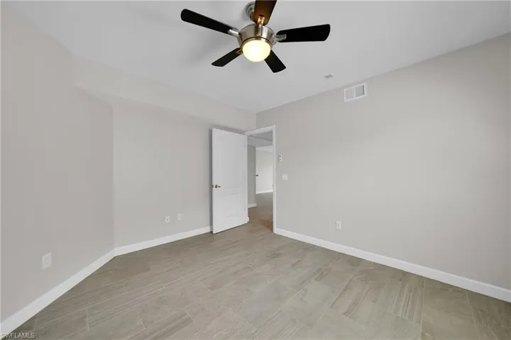 Unfurnished room with ceiling fan